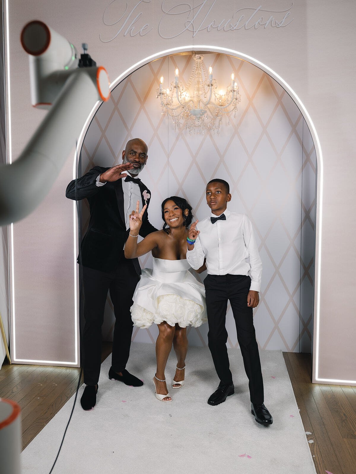Guests posing for The Dallas GlamBot cinematic slow-motion video at luxury Dallas wedding.